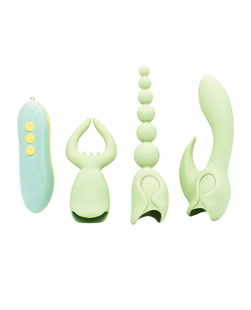 Mint silicone vibrator kit with four attachments laid out